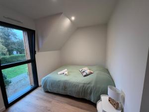 Postel nebo postele na pokoji v ubytování Villa Larmor-baden