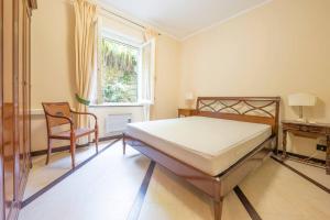 Postel nebo postele na pokoji v ubytování L'Angolo di Portofino