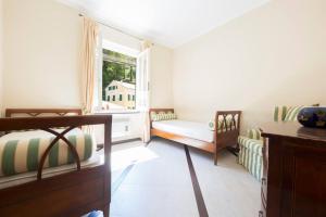 Postel nebo postele na pokoji v ubytování L'Angolo di Portofino