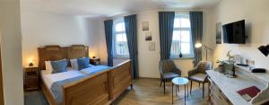 Voodi või voodid majutusasutuse Hotel Zur Fernmühle toas +17 fotot