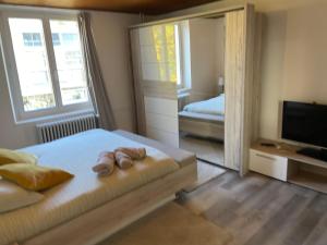 Postel nebo postele na pokoji v ubytování BLISS Basel Residence