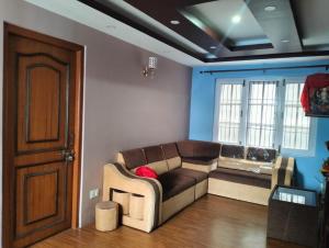 Area soggiorno di Peace Homestay