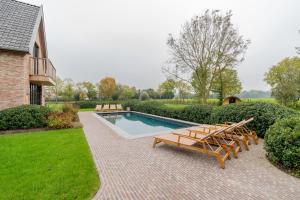 Bazén v ubytování Botanic Experience Holiday House nebo v jeho okolí