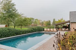 Bazén v ubytování Botanic Experience Holiday House nebo v jeho okolí