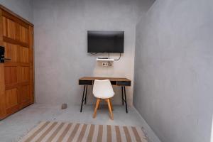 Μια τηλεόραση ή/και κέντρο ψυχαγωγίας στο Palms Lodge