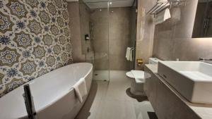 Koupelna v ubytování Myze Hotel Sumenep