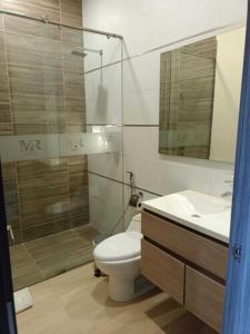 Ένα μπάνιο στο Hotel American Visa Cali