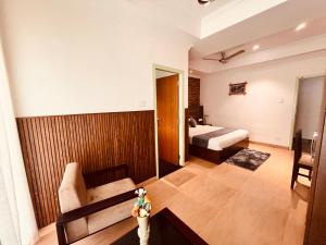 Voodi või voodid majutusasutuse Munnar Tea Estate Cottage and Resort - Away From City Hustle toas