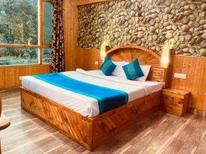 Voodi või voodid majutusasutuse Munnar Tea Estate Cottage and Resort - Away From City Hustle toas