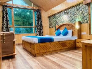 Voodi või voodid majutusasutuse Munnar Tea Estate Cottage and Resort - Away From City Hustle toas