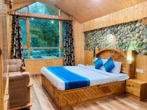 Voodi või voodid majutusasutuse Munnar Tea Estate Cottage and Resort - Away From City Hustle toas