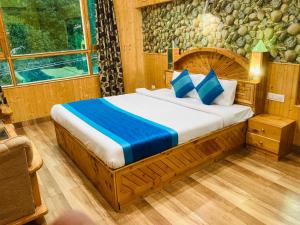 Voodi või voodid majutusasutuse Munnar Tea Estate Cottage and Resort - Away From City Hustle toas