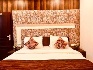 Voodi või voodid majutusasutuse Munnar Tea Estate Cottage and Resort - Away From City Hustle toas