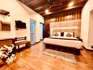 Voodi või voodid majutusasutuse Munnar Tea Estate Cottage and Resort - Away From City Hustle toas