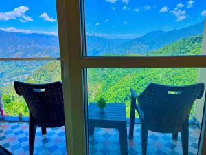 Üldine mäevaade või majutusasutusest Munnar Tea Estate Cottage and Resort - Away From City Hustle pildistatud vaade