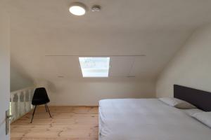 Ένα ή περισσότερα κρεβάτια σε δωμάτιο στο Vakantiewoning Cachalot +11 φωτογραφίες