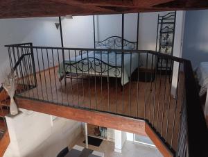 an overhead view of a balcony with a bench at Le Petit Saint Jacques in Cognac