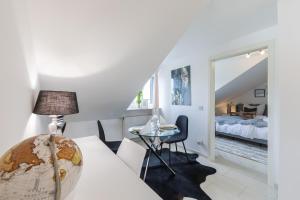 Postel nebo postele na pokoji v ubytování Luxusapartment mit Balkon Nähe Dortmund