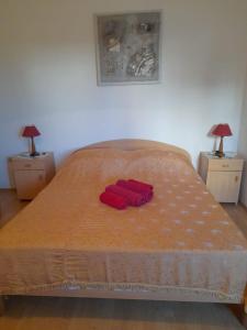 Postel nebo postele na pokoji v ubytování Apartments Jere