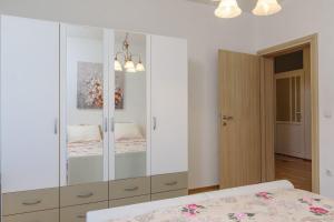 Posteľ alebo postele v izbe v ubytovaní Apartment Vana