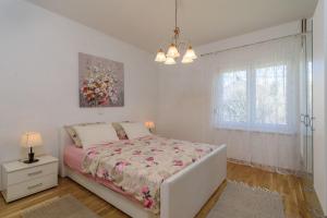 Posteľ alebo postele v izbe v ubytovaní Apartment Vana