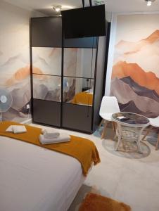 Giường trong phòng chung tại El Refugio del Estrecho