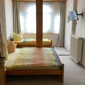 Postel nebo postele na pokoji v ubytování Ferienhaus Schuster