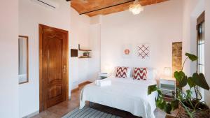 Ένα ή περισσότερα κρεβάτια σε δωμάτιο στο Romantic Duplex with terrace and great views