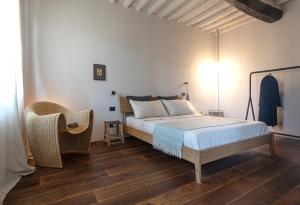 Postel nebo postele na pokoji v ubytování Sant'Ansano Guest house + 35 fotografií