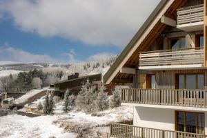 Το Résidence Goélia Les Chalets de Super-Besse τον χειμώνα