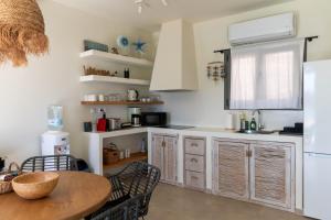 A cozinha ou cozinha compacta de Deja Blue Villa 1