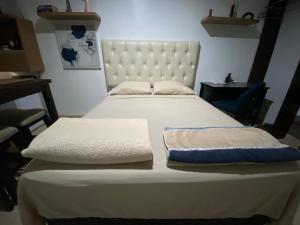 Postel nebo postele na pokoji v ubytování Suite Noa Apartamento
