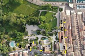 an overhead view of a park with buildings and trees at Rambaldi Apartments Casa nr 4 in Bardolino