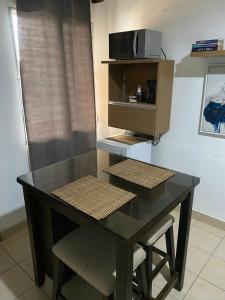 Η κουζίνα ή μικρή κουζίνα στο Suite Noa Apartamento