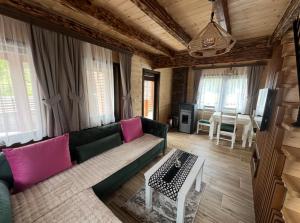 Posezení v ubytování Zagrad Homes in Zabljak