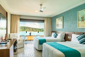 Postel nebo postele na pokoji v ubytování Hotel Ferradura Private