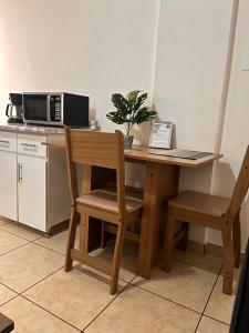 Η κουζίνα ή μικρή κουζίνα στο Apartamentos Trebol
