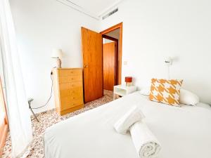 En eller flere senge i et værelse på MyFlats Calm Beach