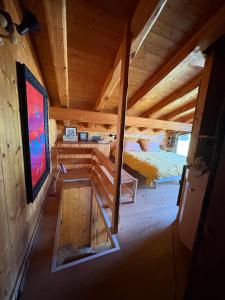 an overhead view of a bedroom in a log cabin at Hameau de la Côte in Les Houches