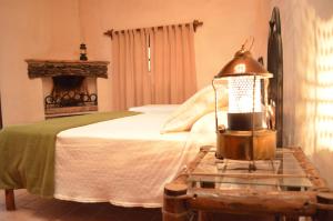 A bed or beds in a room at Finca El Carmen