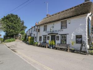 a white building on the side of a street at The Beach Hut in Newquay