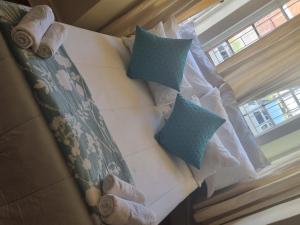 Postel nebo postele na pokoji v ubytování HOME AWAY FROM HOME