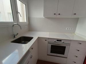 Кухня или мини-кухня в Apartamento Familiar con Vistas Espectaculares
