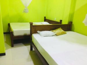 Voodi või voodid majutusasutuse Hostel Ambel toas