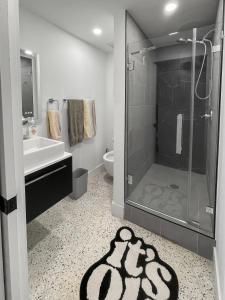 a bathroom with a shower and a sink at Newly Remodeled full Apartment in Miami +10 photos