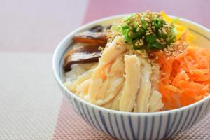 a bowl of food with rice and carrots and sausage at Hotel Hokke Club Kagoshima in Kagoshima +22 photos