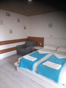 Postel nebo postele na pokoji v ubytování Esmeralda Butik Hotel