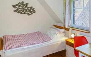 Ένα ή περισσότερα κρεβάτια σε δωμάτιο στο Haus Vierjahreszeiten 2