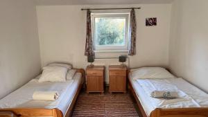 Cama ou camas em um quarto em Starý dom