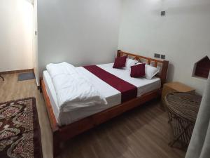 A bed or beds in a room at Mount Fuji Homestay